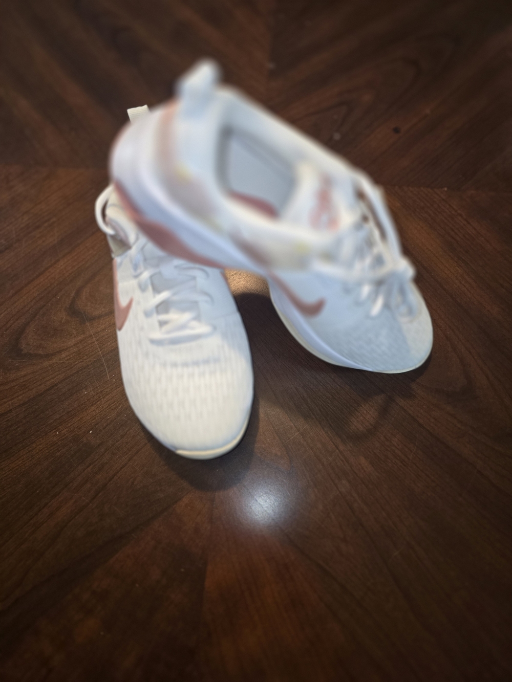 Nike Women’s White Sneakers with Pink Swoosh